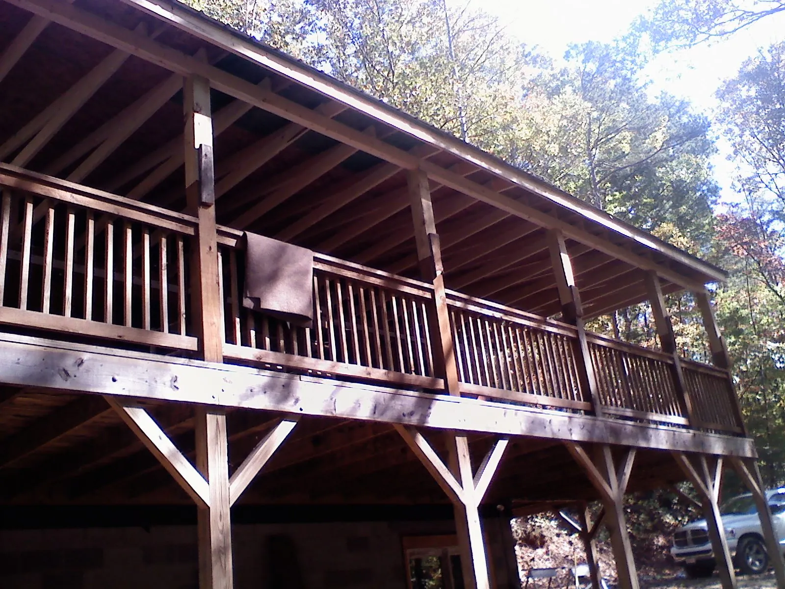 Timber framing under a new elevated porch and deck — Roof Leak Repair in Loves Park by Roofing Brothers